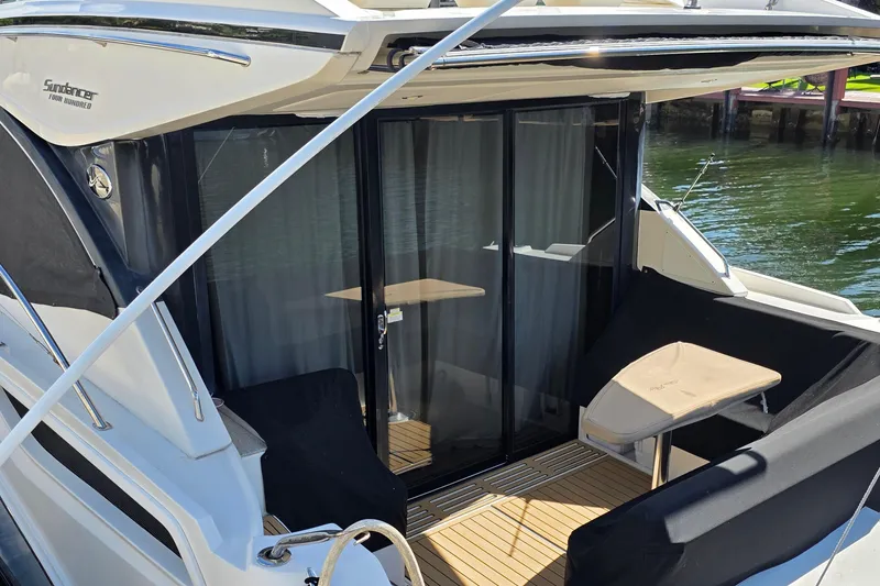Slide: The Image of 2016 Sea Ray Sundancer 400 yacht with sleek design and spacious deck area. - 80