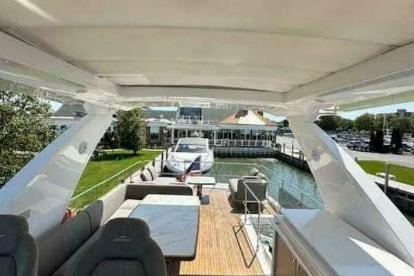 Slide: The Image of Luxurious 2020 Azimut 66 yacht with spacious deck and elegant seating area. - 17