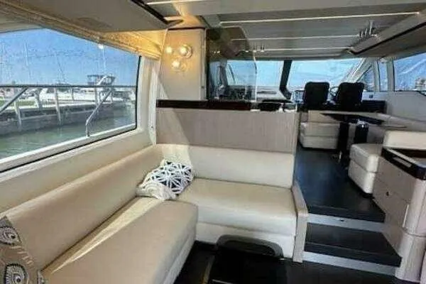 Slide: The Image of Luxurious interior of a 2020 Azimut 66 yacht with elegant seating and modern design. - 30