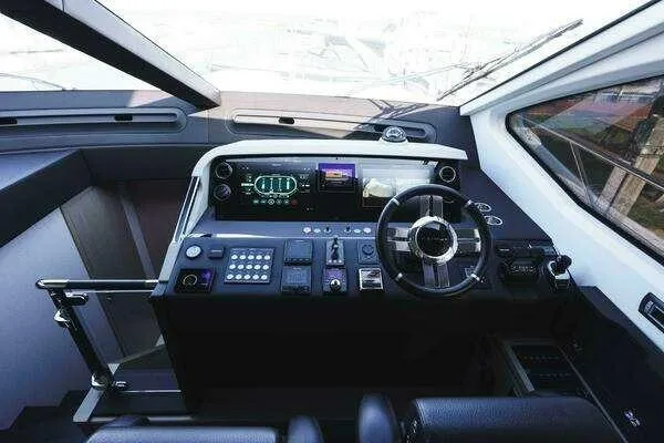 Slide: The Image of Cockpit of 2020 Azimut 66 yacht with modern navigation controls and sleek design. - 40