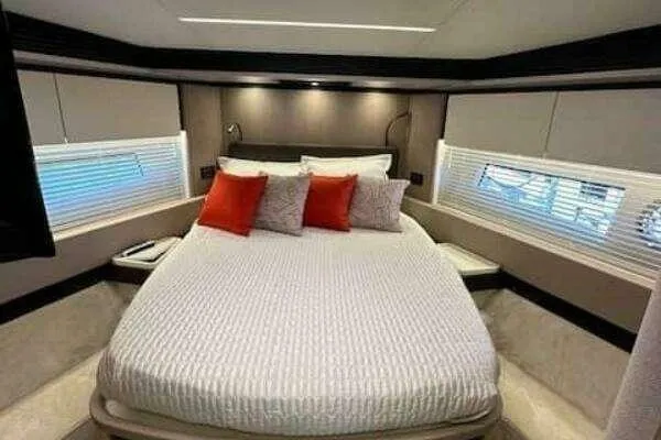 Slide: The Image of Luxurious bedroom interior of 2020 Azimut 66 yacht with modern design and cozy bedding. - 47