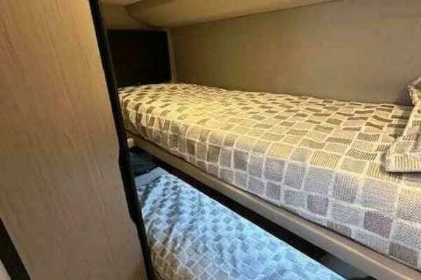 Slide: The Image of Bunk beds in 2020 Azimut 66 yacht cabin with patterned bedding. - 50