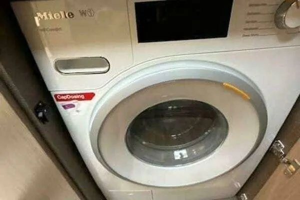 Slide: The Image of Miele washing machine in Azimut 66 yacht, 2020 model, featuring CapDosing technology. - 52