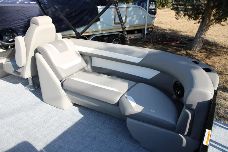 Slide: The Image of 2026 Premier 220 Sunscape RF boat interior with luxurious gray seating and modern design. - 3