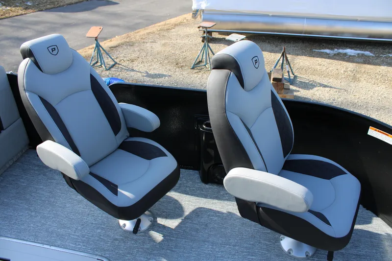 Slide: The Image of Luxury seating on 2026 Premier 230 Sunsation RS pontoon boat, featuring plush gray and black design. - 11