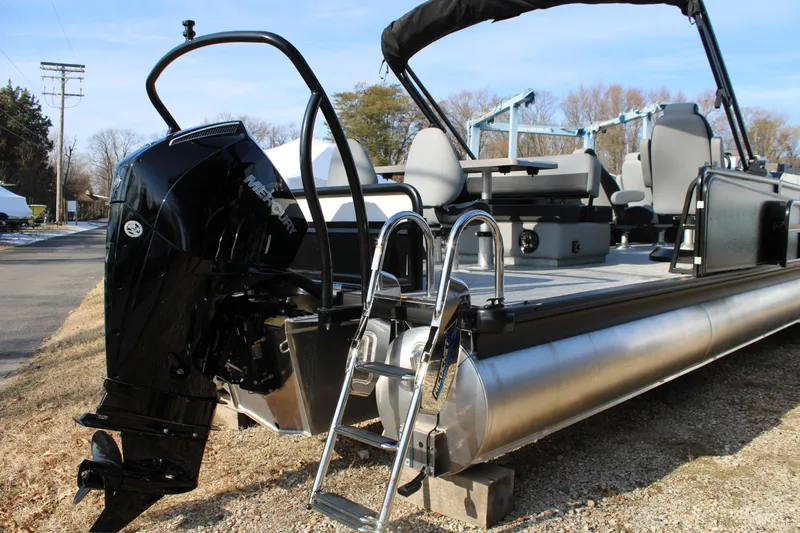 Slide: The Image of 2026 Premier 230 Sunsation RS pontoon boat with Mercury outboard motor and ladder. - 4