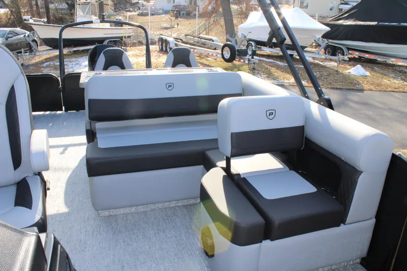 Slide: The Image of Interior of 2026 Premier 230 Sunsation RS pontoon boat with stylish seating. - 7