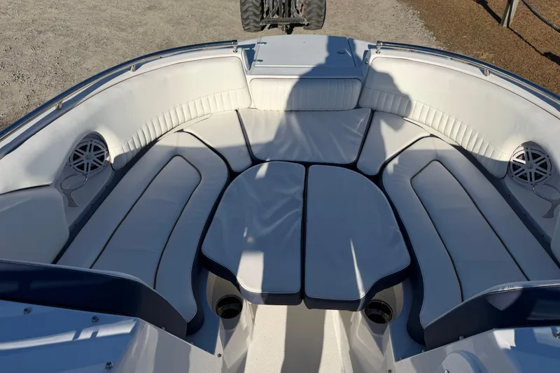 Slide: The Image of 2026 Stingray 231 DC boat interior with spacious seating and modern design. - 11