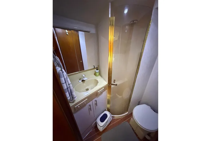 Slide: The Image of Bathroom interior of 2001 Ocean Yachts 40 Super Sport with shower and sink. - 22
