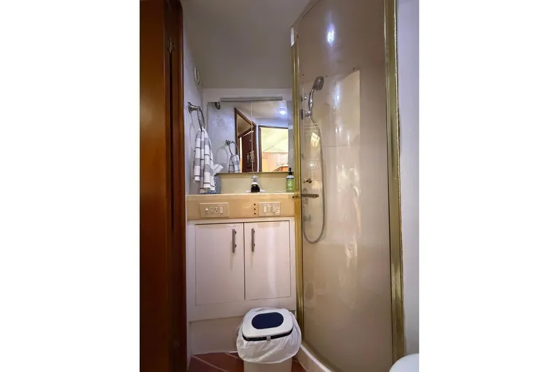 Slide: The Image of Bathroom interior of 2001 Ocean Yachts 40 Super Sport with shower and vanity. - 23