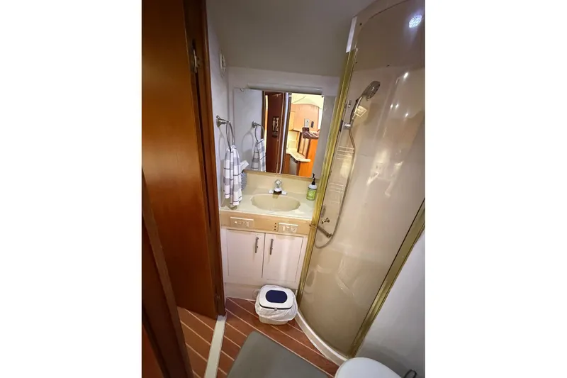 Slide: The Image of Bathroom interior of 2001 Ocean Yachts 40 Super Sport with shower and sink. - 24