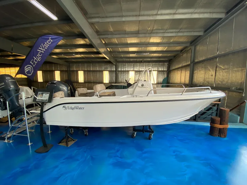 The Image of 2024 Edgewater 170CC Center Console boat displayed indoors. - 0