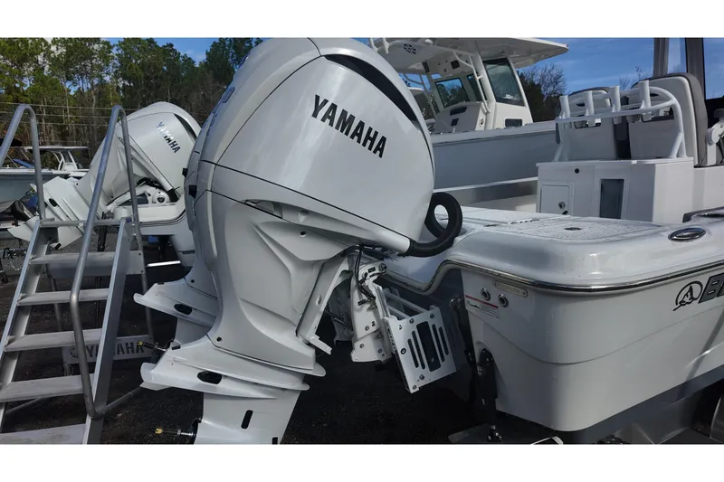Slide: The Image of 2026 Blazer Bay Makaira 2800 with Yamaha outboard engines, docked and ready for adventure. - 21