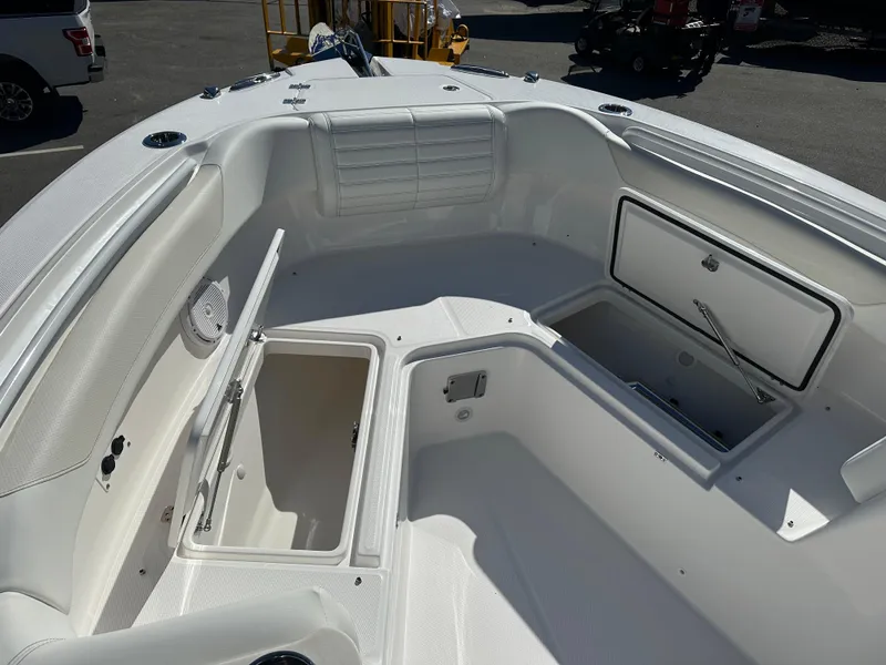 Slide: The Image of 2025 Edgewater 262 Center Console boat interior with open storage compartments. - 35