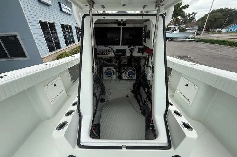 Slide: The Image of 2007 Yellowfin 34 Offshore boat interior showing engine compartment and controls. - 4