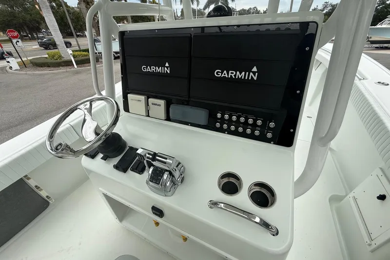 Slide: The Image of 2007 Yellowfin 34 Offshore boat console with Garmin navigation system and controls. - 8