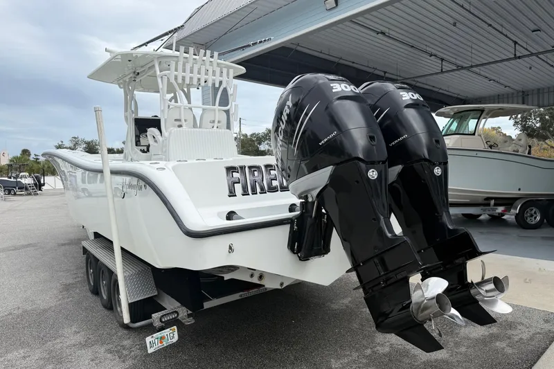 Slide: The Image of 2007 Yellowfin 34 Offshore with twin Mercury engines at dock. - 2