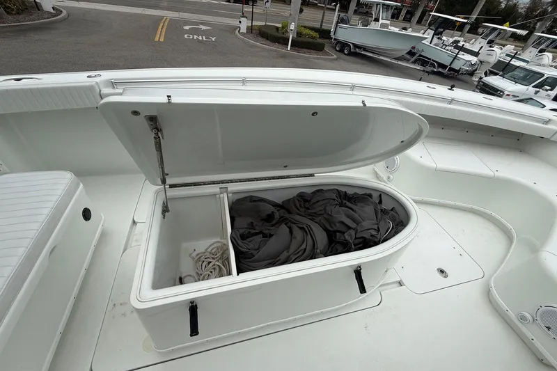 Slide: The Image of Open storage compartment on a 2007 Yellowfin 34 Offshore boat. - 6