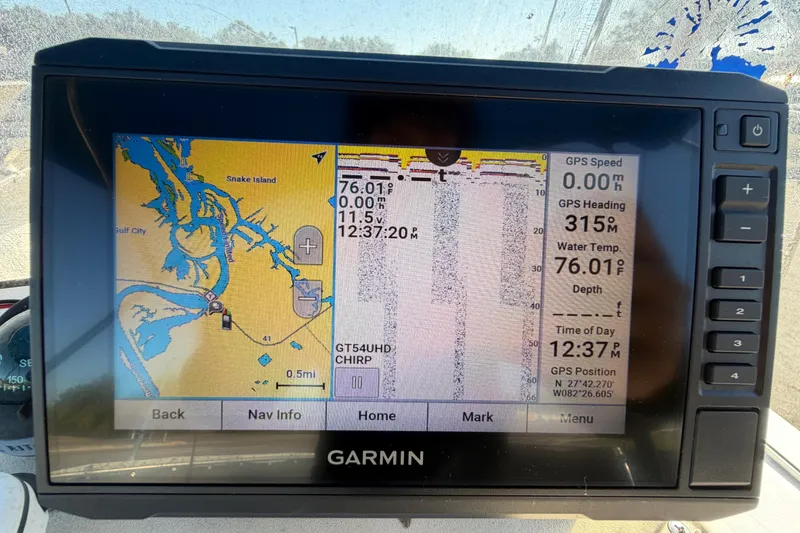 Slide: The Image of Garmin GPS display on 1991 Grady-White Spirit 175, showing map and navigation data. - 22