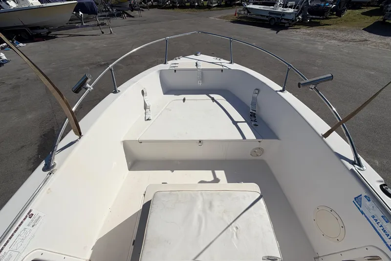 Slide: The Image of 1991 Grady-White Spirit 175 boat interior with seating and railings. - 34