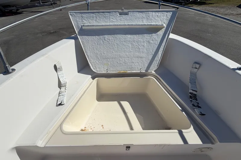 Slide: The Image of Open storage compartment on 1991 Grady-White Spirit 175 boat deck. - 37