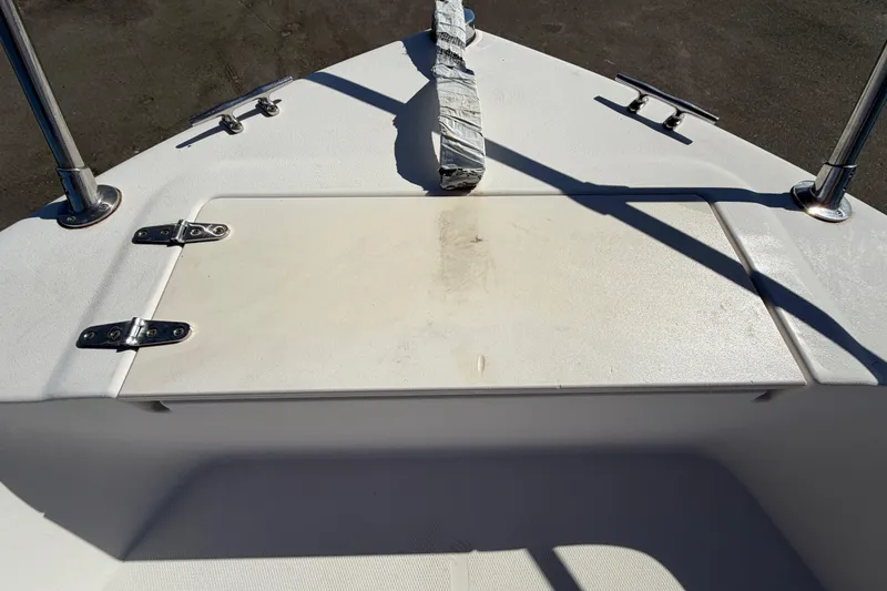 Slide: The Image of Bow of 1991 Grady-White Spirit 175 boat with hatch and metal fittings. - 39