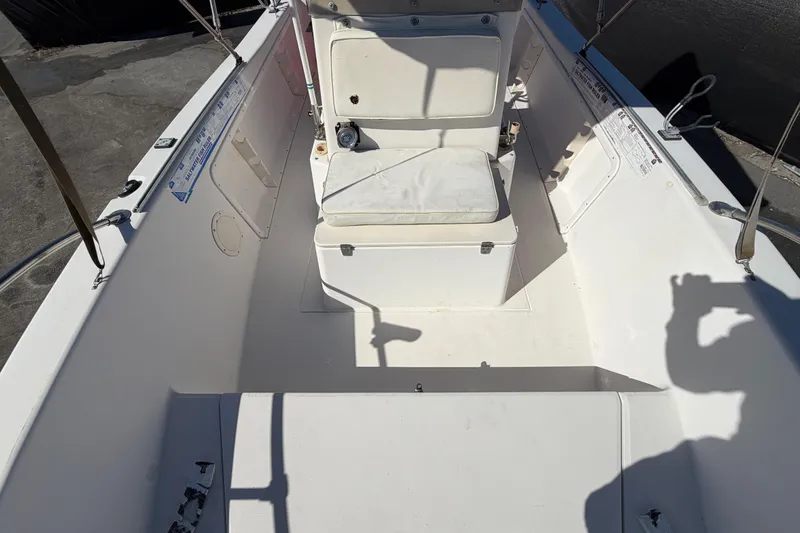 Slide: The Image of 1991 Grady-White Spirit 175 boat interior with seating and storage compartments. - 44