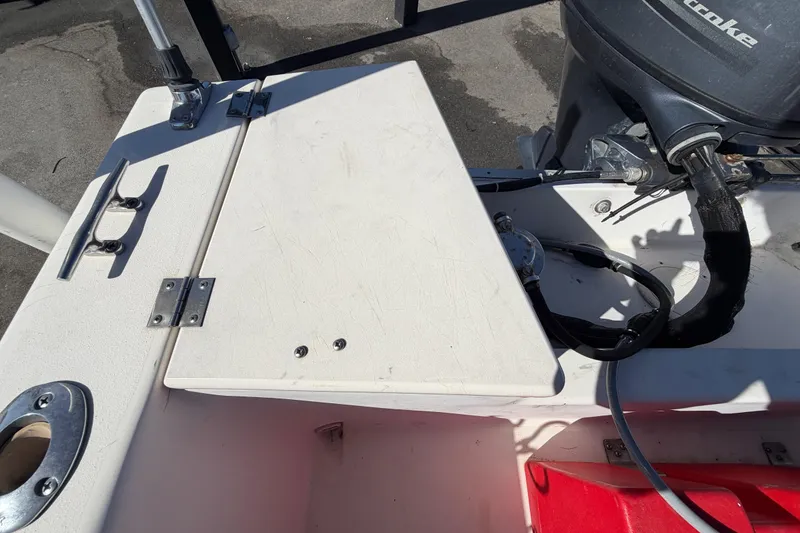 Slide: The Image of 1991 Grady-White Spirit 175 boat with outboard motor and deck details. - 51