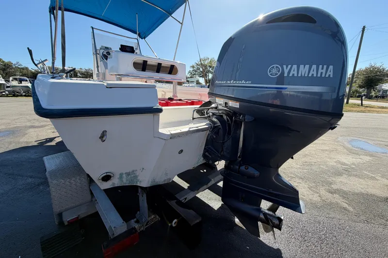 Slide: The Image of 1991 Grady-White Spirit 175 boat with Yamaha outboard motor on trailer. - 7