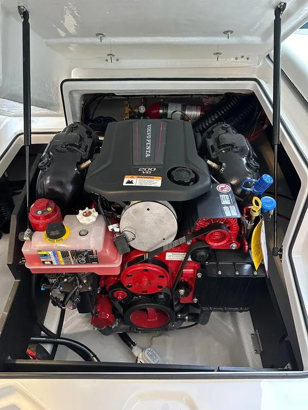 Slide: The Image of 2025 Regal 2000ES Bowrider engine compartment with Volvo Penta motor. - 19