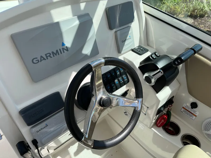 Slide: The Image of 2018 Sailfish 275 DC helm with Garmin technology. - 19