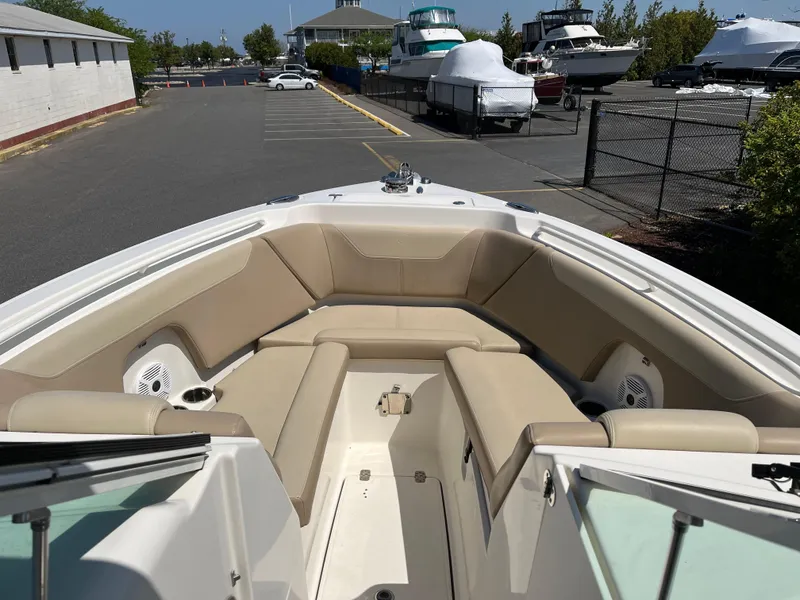 Slide: The Image of Interior view of a 2018 Sailfish 275 DC boat at the marina. - 20