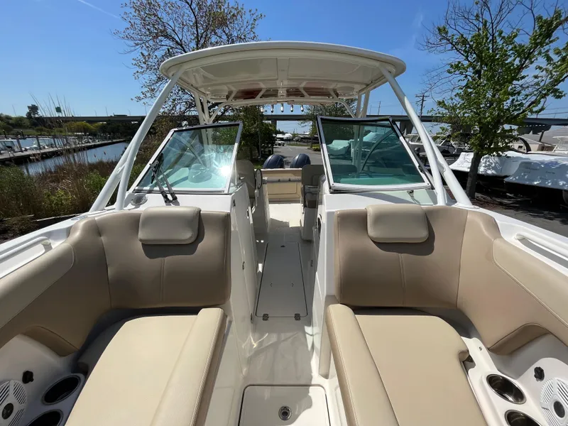 Slide: The Image of Interior view of a 2018 Sailfish 275 DC boat under sunny skies. - 23