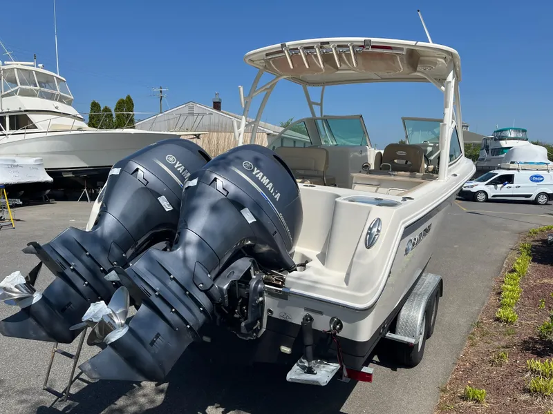 Slide: The Image of 2018 Sailfish 275 DC boat with Yamaha outboard engines. - 6
