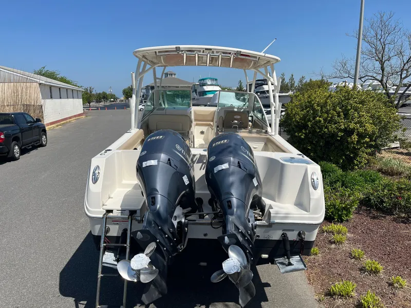 Slide: The Image of 2018 Sailfish 275 DC boat with dual outboard engines. - 7
