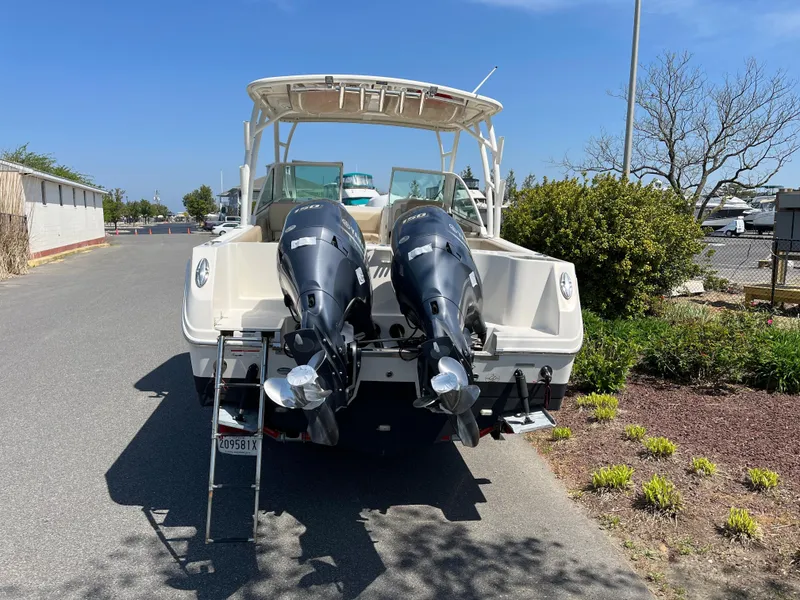 Slide: The Image of 2018 Sailfish 275 DC boat with dual outboard engines. - 8