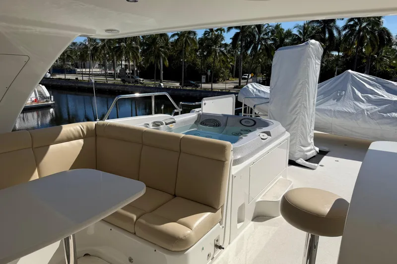 Slide: The Image of Luxurious 2014 Pacific Mariner 85 Motor Yacht with outdoor seating and hot tub. - 11