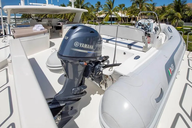 Slide: The Image of 2014 Pacific Mariner 85 Motor Yacht with Yamaha outboard engine and inflatable tender on deck. - 16