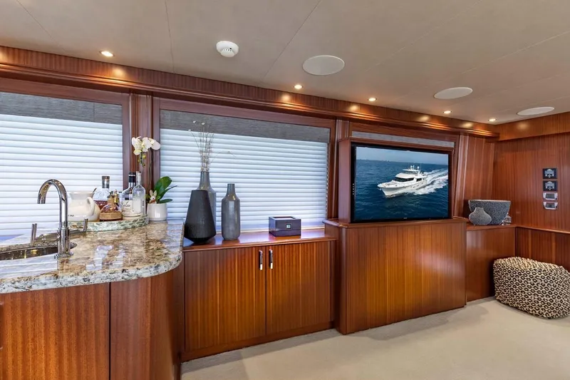 Slide: The Image of Luxurious interior of 2014 Pacific Mariner 85 Motor Yacht with elegant wood paneling and modern amenities. - 26