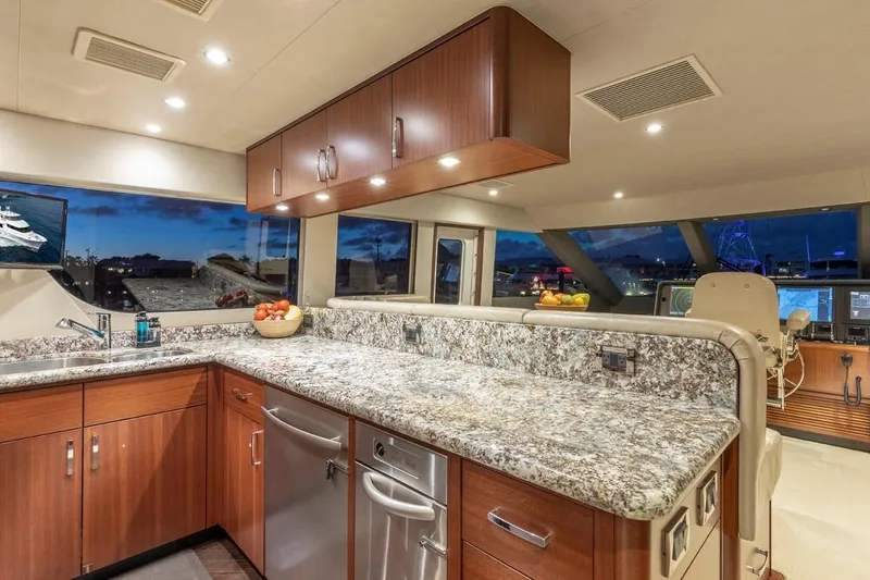 Slide: The Image of Luxurious kitchen interior of 2014 Pacific Mariner 85 Motor Yacht with granite countertops. - 30