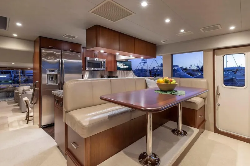 Slide: The Image of Luxurious interior of 2014 Pacific Mariner 85 Motor Yacht with modern kitchen and dining area. - 32