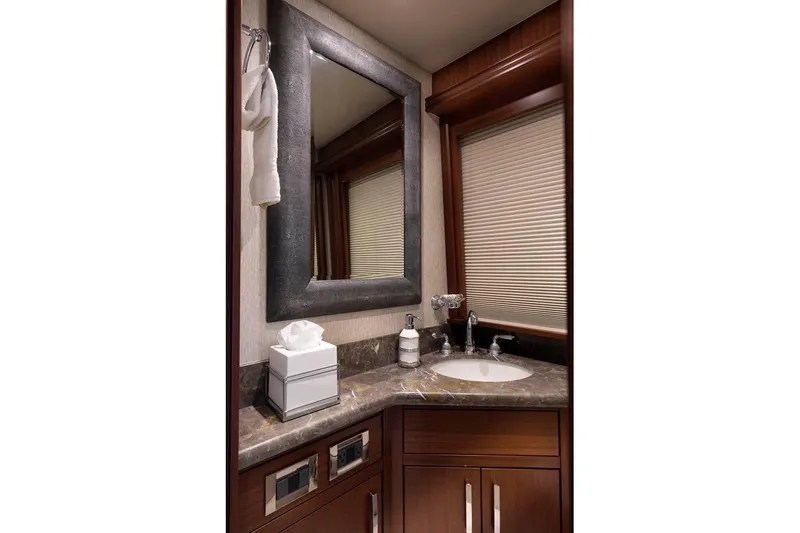 Slide: The Image of Luxurious bathroom vanity in 2014 Pacific Mariner 85 Motor Yacht with marble countertop. - 33