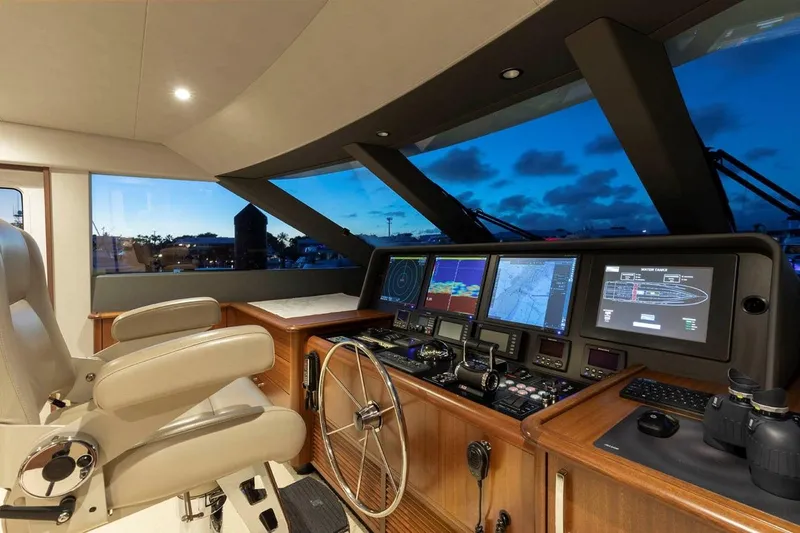 Slide: The Image of Helm of 2014 Pacific Mariner 85 Motor Yacht with advanced navigation systems at sunset. - 34