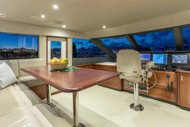 Slide: The Image of Luxurious interior of 2014 Pacific Mariner 85 Motor Yacht with helm and dining area. - 35