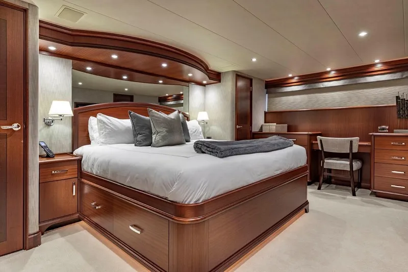 Slide: The Image of Luxurious bedroom in 2014 Pacific Mariner 85 Motor Yacht with elegant wood furnishings. - 36