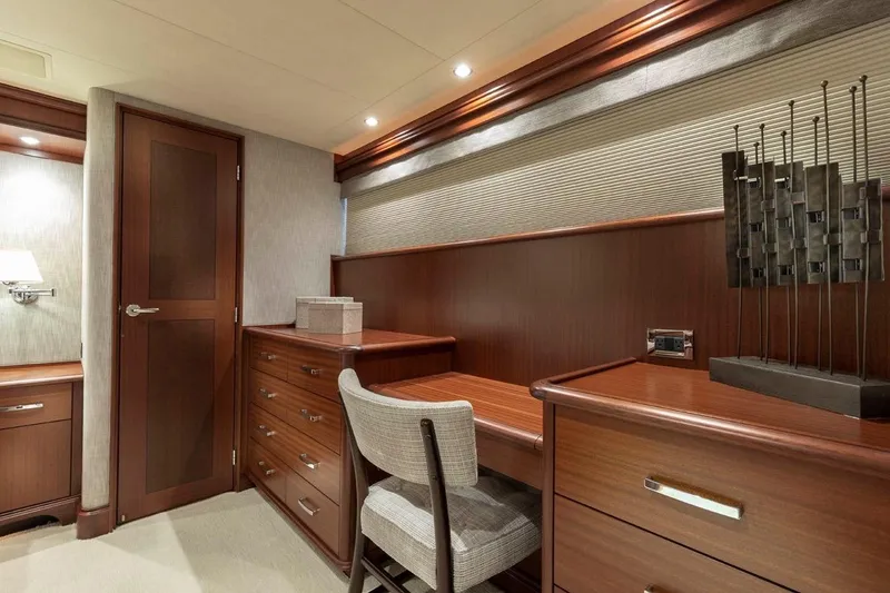 Slide: The Image of Luxurious interior of 2014 Pacific Mariner 85 Motor Yacht with elegant wood furnishings. - 38