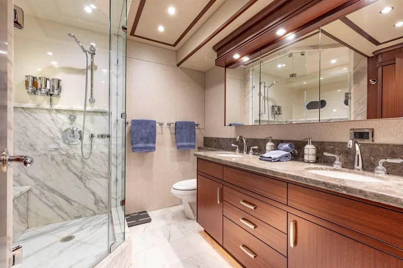 Slide: The Image of Luxurious bathroom in 2014 Pacific Mariner 85 Motor Yacht with marble shower and double sinks. - 39