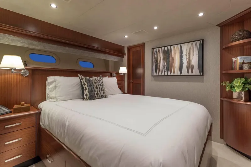 Slide: The Image of Luxurious bedroom interior of 2014 Pacific Mariner 85 Motor Yacht with elegant wood finishes. - 40