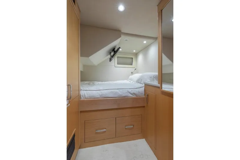 Slide: The Image of Luxurious cabin interior of 2014 Pacific Mariner 85 Motor Yacht with cozy bed and storage. - 50
