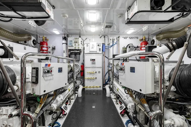 Slide: The Image of Engine room of 2014 Pacific Mariner 85 Motor Yacht, featuring advanced machinery and equipment. - 53